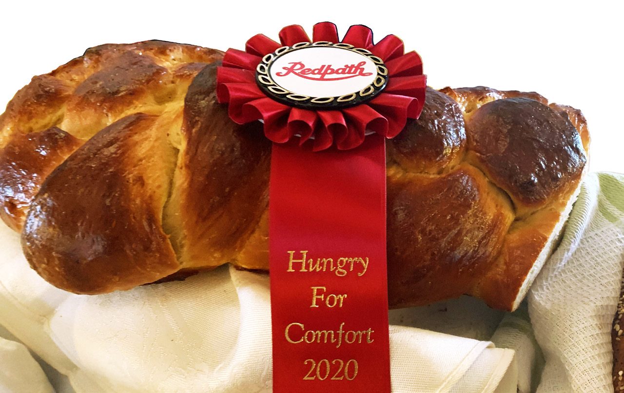 Traditional challah bread and marmalade with Redpath competition ribbon