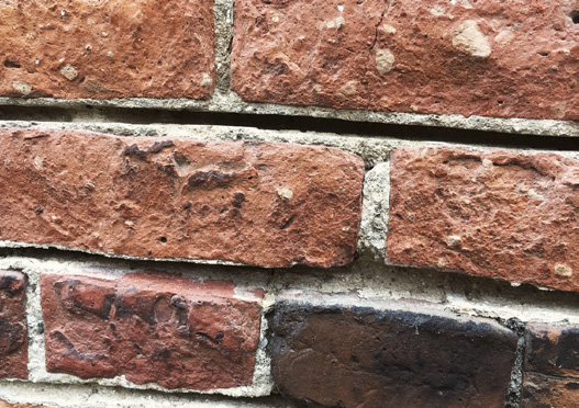 Close-up of deteriorated brickwork