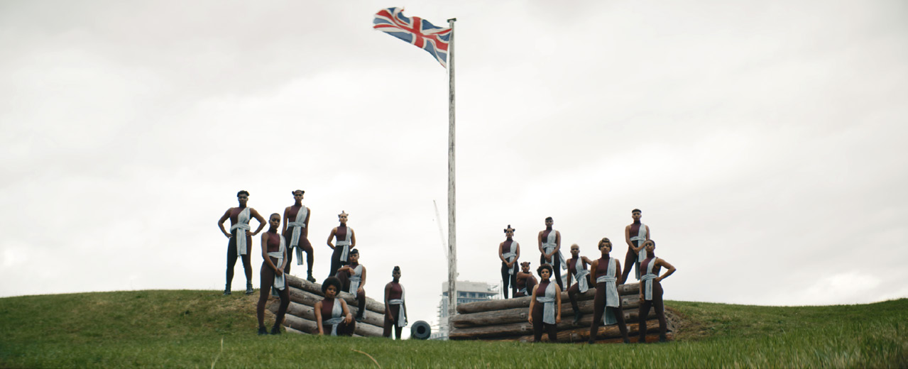 Tableau of 15 dancers in a battery of Fort York